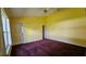 Bedroom with a large window, plush carpet, ceiling fan, and closet at 12512 Draw Dr Dr, Grand Island, FL 32735