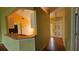 Open kitchen with a breakfast bar overlooking the living room and entry at 12512 Draw Dr Dr, Grand Island, FL 32735