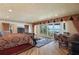 Elegant main bedroom features a spacious layout, water views, and stylish furnishings at 13033 Se 158Th Ln, Weirsdale, FL 32195