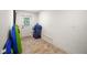 Functional mud room features tiled floors and an exit door for easy access to outdoor activities at 13033 Se 158Th Ln, Weirsdale, FL 32195