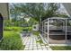 Outdoor space with a gazebo, hot tub and outdoor dining offers relaxation and entertainment at 135 N James Pl, Groveland, FL 34736