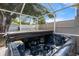 A premium hot tub offers relaxation and hydrotherapy in a private outdoor setting at 135 N James Pl, Groveland, FL 34736