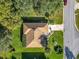 Well-maintained home with manicured lawn and landscaping, featuring a charming walkway and inviting curb appeal at 13700 Se 90Th Ct, Summerfield, FL 34491
