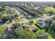 A neighborhood featuring mature trees, landscaping, and golf course views at 13700 Se 90Th Ct, Summerfield, FL 34491
