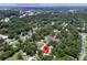 Aerial view of the location of the home in relation to Downtown Ocala, surrounded by trees at 1537 Ne 22Nd St, Ocala, FL 34470