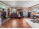 Bright living room with hardwood floors and a fireplace at 15733 Tower View Dr, Clermont, FL 34711