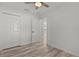 This bedroom offers a ceiling fan and double closet at 15828 Se 98Th Ter, Summerfield, FL 34491