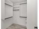 Walk-in closet offers convenient hanging and shelf storage at 15828 Se 98Th Ter, Summerfield, FL 34491