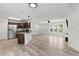 Open floorplan showcasing a kitchen with stainless steel appliances, and bright living area at 15828 Se 98Th Ter, Summerfield, FL 34491