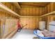 Functional shed interior view, providing storage with shelves and concrete flooring at 15828 Se 98Th Ter, Summerfield, FL 34491