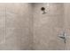 Updated shower features gray tile and chrome hardware at 15828 Se 98Th Ter, Summerfield, FL 34491