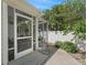 Cozy screened patio providing a comfortable transition from indoor to outdoor spaces at 1762 Meadowlark Ave, The Villages, FL 32162