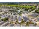 An aerial view of the property highlighting its location within a well-maintained community, close to the golf course at 2101 Southern Star Way, The Villages, FL 32162