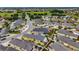 Beautiful aerial view showcasing the home, its inviting outdoor living spaces, and surrounding neighborhood's lush, green landscaping at 2101 Southern Star Way, The Villages, FL 32162