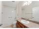Well-lit bathroom with a tub and shower combination, and neutral countertop at 2101 Southern Star Way, The Villages, FL 32162