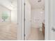 This bedroom is connected to the bathroom at 2101 Southern Star Way, The Villages, FL 32162