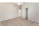 Bedroom showcasing a closet, wood floors, and a ceiling fan at 2101 Southern Star Way, The Villages, FL 32162
