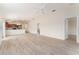 Open concept living room and kitchen area with recessed lighting, tile floors, and ceiling fan at 2101 Southern Star Way, The Villages, FL 32162