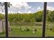 Inviting backyard with a metal fence, perfect for outdoor enjoyment at 2110 Churchill Downs Cir, Orlando, FL 32825