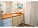 Bathroom featuring a large mirror, storage, and modern fixtures at 2110 Churchill Downs Cir, Orlando, FL 32825