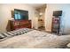 Comfortable bedroom featuring a television and a spacious dresser at 2110 Churchill Downs Cir, Orlando, FL 32825
