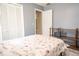Clean and spacious bedroom with a large closet and a wooden shelf at 2110 Churchill Downs Cir, Orlando, FL 32825