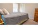 Comfortable bedroom with a window and a closet offering a relaxing and private space at 2110 Churchill Downs Cir, Orlando, FL 32825