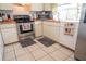 Functional kitchen with stainless steel oven and matching appliances, ideal for cooking enthusiasts at 2110 Churchill Downs Cir, Orlando, FL 32825