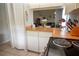 Open kitchen view connecting to the dining area, perfect for modern living and entertaining at 2110 Churchill Downs Cir, Orlando, FL 32825