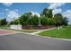 Street view of the brick monument sign for Surrey Ridge in a residential neighborhood at 2110 Churchill Downs Cir, Orlando, FL 32825