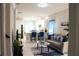 Cozy living room flows into the kitchen, featuring an open concept design at 2112 Waitman, Leesburg, FL 34748