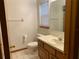 Bathroom featuring a vanity, mirror, and tile floors at 2530 Shady Ln, Groveland, FL 34736
