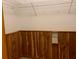 Walk-in closet offering wood paneling and wire shelving at 2530 Shady Ln, Groveland, FL 34736