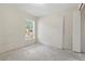 Comfortable bedroom offering natural light from a window and ample space for personal customization at 2708 Lorraine Dr, Leesburg, FL 34748