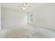 Bedroom featuring a ceiling fan and a window for natural light at 2708 Lorraine Dr, Leesburg, FL 34748
