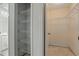 A storage closet and a walk-in closet with a built-in shelving system for a neat and organized living space at 2708 Lorraine Dr, Leesburg, FL 34748