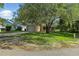 Front yard with driveway and street view at 2708 Lorraine Dr, Leesburg, FL 34748