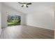 Spacious living room featuring modern floors and an abundance of natural light at 2708 Lorraine Dr, Leesburg, FL 34748
