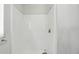 Bright white shower featuring brushed silver shower head and faucet at 2708 Lorraine Dr, Leesburg, FL 34748