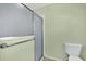Neutral colored bathroom featuring shower and toilet at 2881 Manor Downs, The Villages, FL 32162