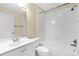 Bright bathroom featuring a shower-tub combo and modern white vanity at 2881 Manor Downs, The Villages, FL 32162