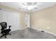 Spacious bedroom featuring closet and natural light at 2881 Manor Downs, The Villages, FL 32162