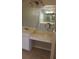 Bathroom vanity with vanity and large mirror. Provides ample counter space and elegant design at 31104 Fairvista Dr, Tavares, FL 32778