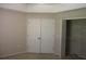 Bright bedroom with closet storage and neutral walls providing a serene and inviting atmosphere at 31104 Fairvista Dr, Tavares, FL 32778