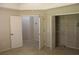 A light filled bedroom featuring ample closet space for optimal storage at 31104 Fairvista Dr, Tavares, FL 32778