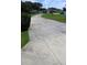 Long driveway leading to the house and garage at 31104 Fairvista Dr, Tavares, FL 32778