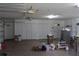 Garage interior with storage cabinets and access doors to the house at 31104 Fairvista Dr, Tavares, FL 32778