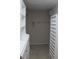 Functional walk-in closet with clean white shelving and ample storage space at 31104 Fairvista Dr, Tavares, FL 32778