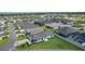 Home with manicured lawn, complemented by a view of the surrounding neighborhood at 3283 Dawn Pl, The Villages, FL 32163