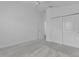 Bedroom with a closet and neutral carpeting. Features a ceiling fan and lots of natural light at 3283 Dawn Pl, The Villages, FL 32163